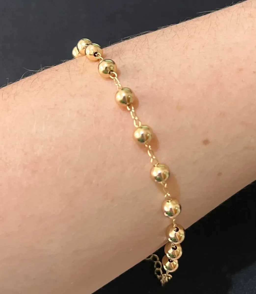 Pulseira 12 bolas p Dou