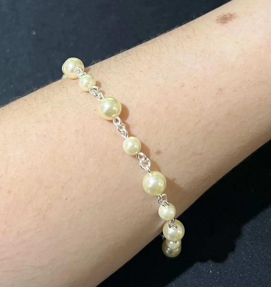 Pulseira pérola p e m junto Pr
