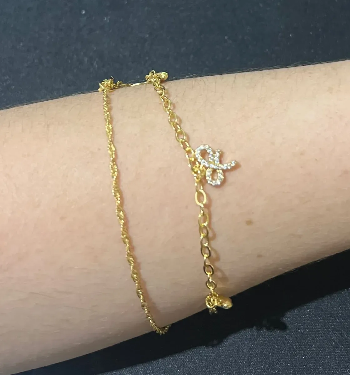 Pulseira dupla pend laço coraç Dou