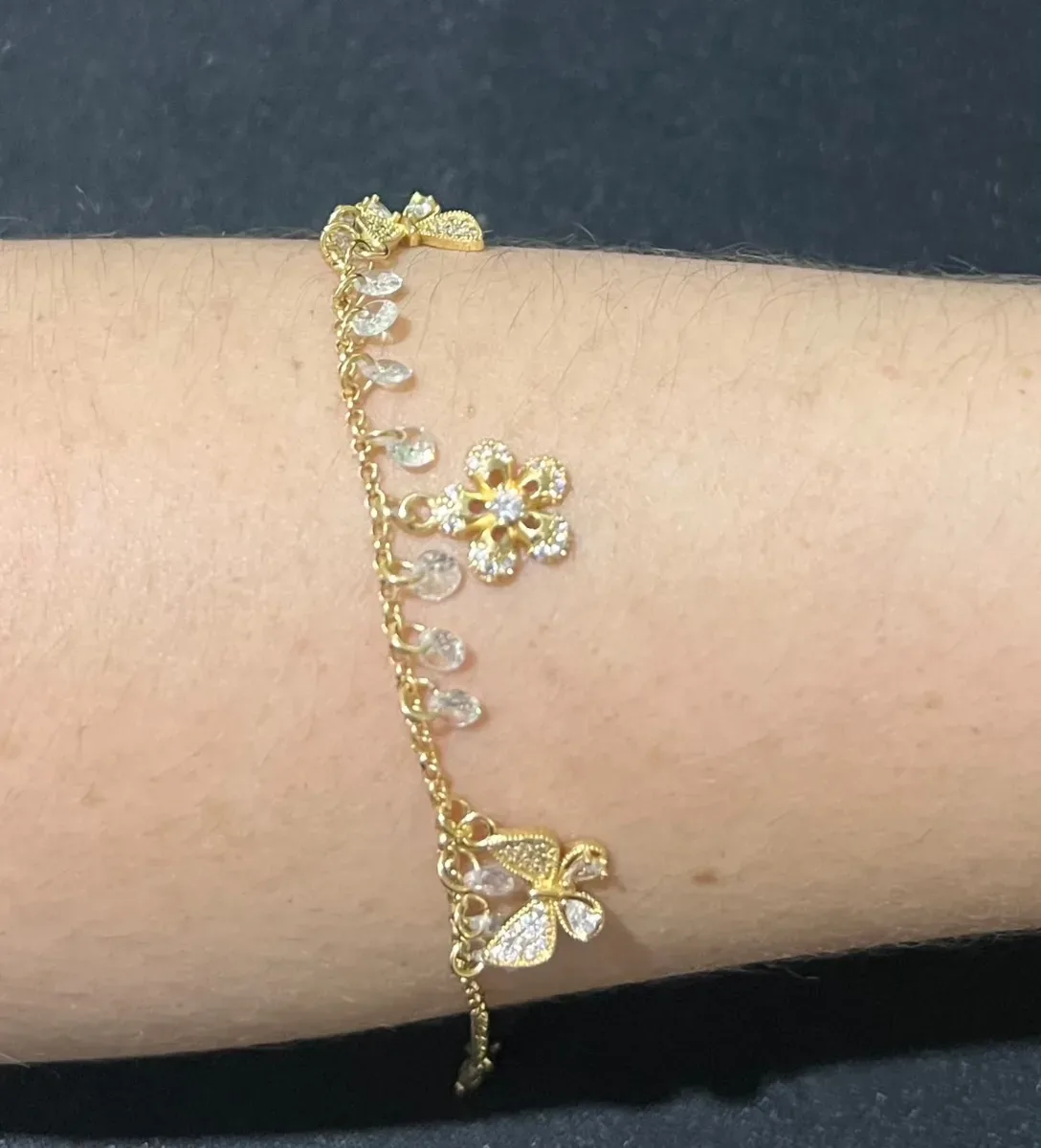 Pulseira pend flor e borbo pedra Dou