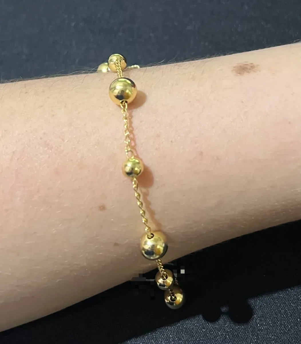 Pulseira bola p e m junto Dou