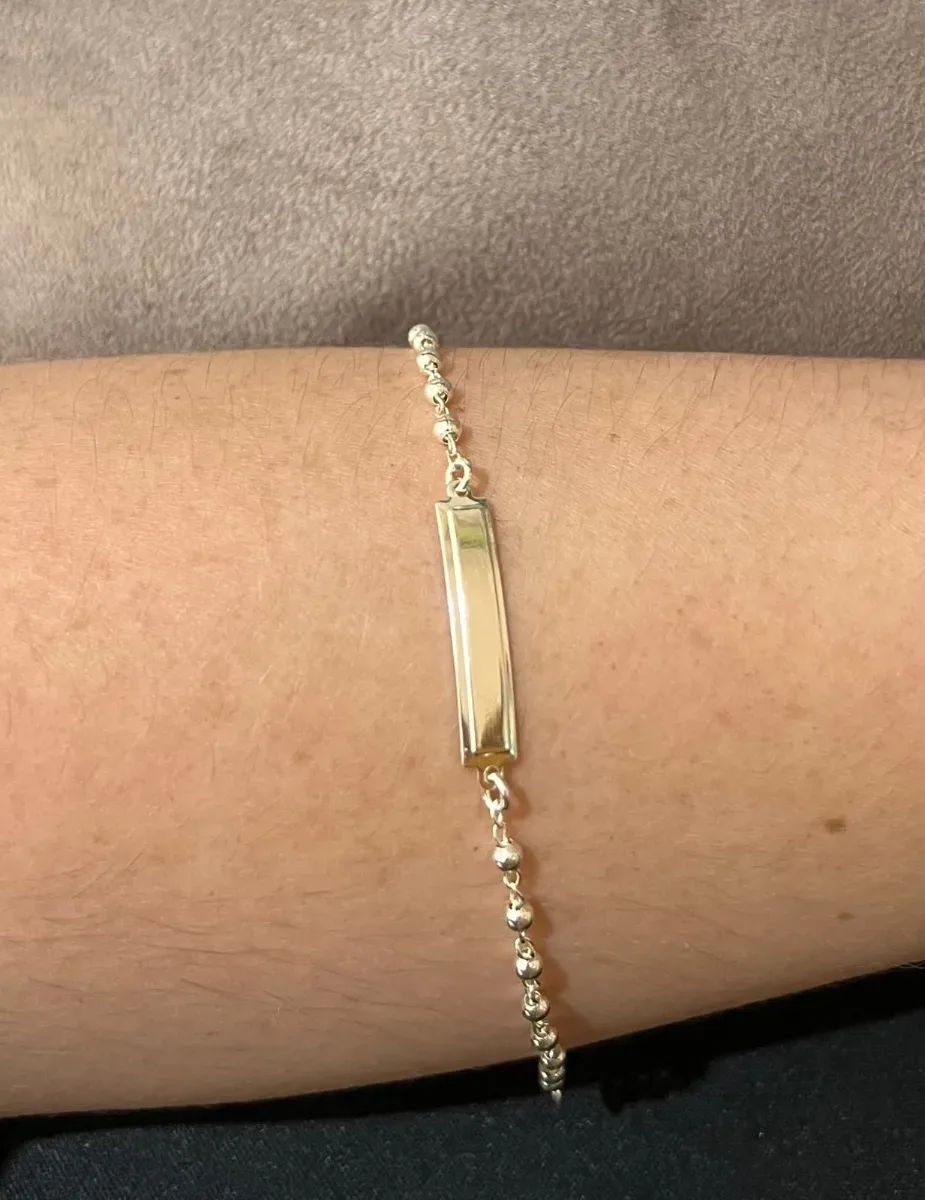 Pulseira inf placa bolinha Pr