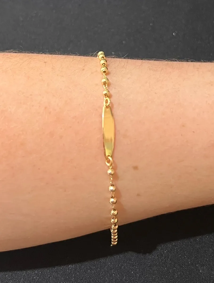 Pulseira inf placa diferente bolinha Dou